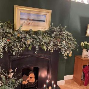 Lounge painted in Farrow and Ball Duck Green