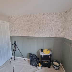 Lounge with Green/Grey Panelling and Jane Clayton & Company Wallpaper
